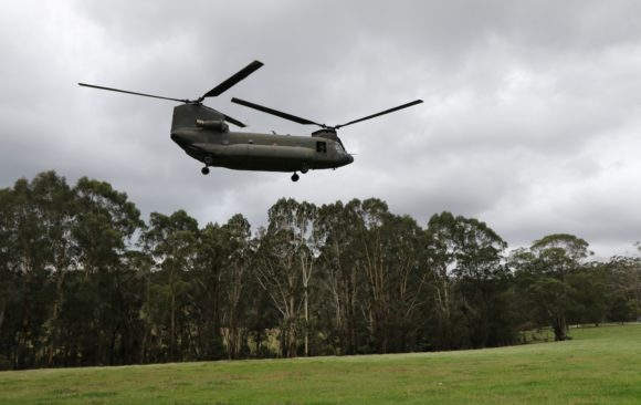 A Chinook helicopter touching down to commence Project Bristlebird